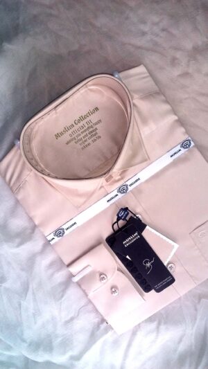 cream color shirt